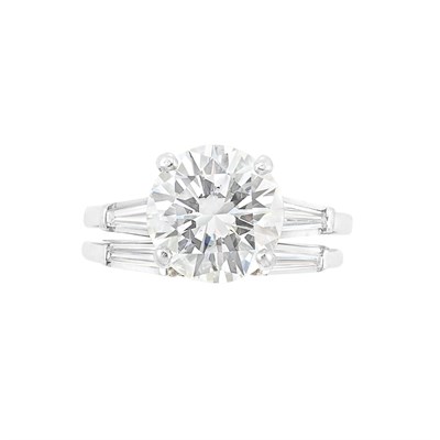 Lot 331 - Platinum and Diamond Ring and Guard Ring