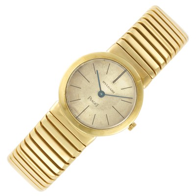 Lot 33 - Gold 'Tubogas' Bangle-Watch, Bulgari, Piaget
