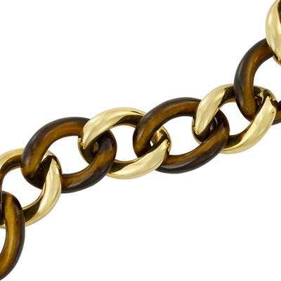 Lot 207 - Gold and Tiger's Eye Link Bracelet