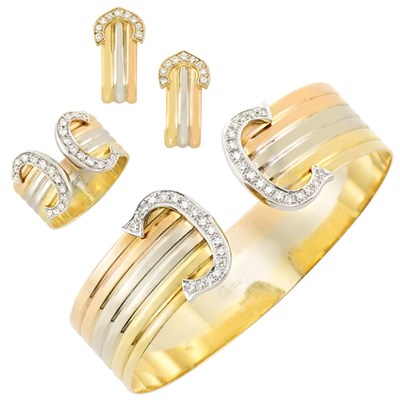Lot 285 - Tricolor Gold and Diamond 'Double C' Cuff Bangle Bracelet and Ring, Cartier, and Pair of Earrings