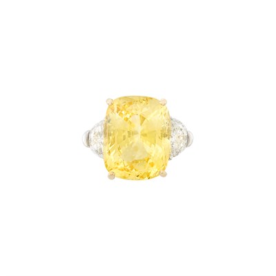 Lot 456 - Platinum, Gold, Yellow Sapphire and Diamond Ring