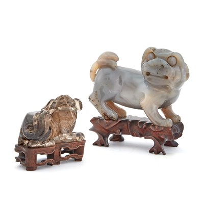 Lot 1142 - Two Chinese Carved Hardstone Figures of Fu...