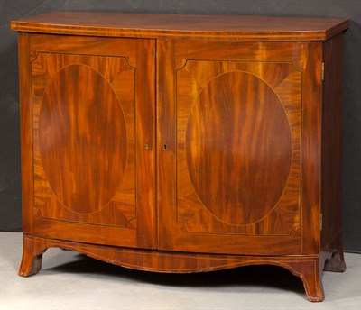 Lot 1202 - Late Regency Mahogany Bowfront Two Door...