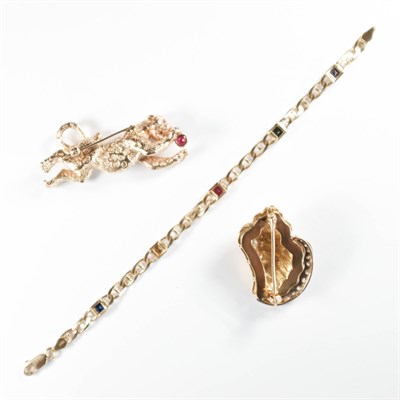 Lot 174 - Gold and Diamond Shell Brooch, Leopard Brooch and Simulated Colored Stone Bracelet
