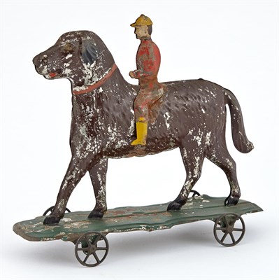 Lot 76 - Dog and Rider Tin Pull Toy Dark Brown dog with...