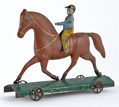 Lot 68 - Horse and Rider Tin Pull Toy Brown horse with...