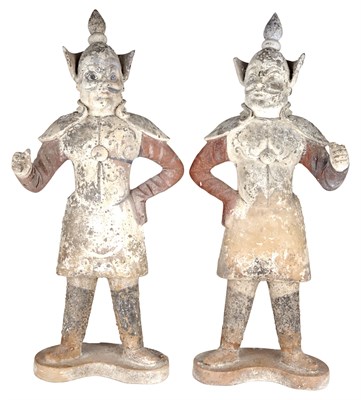 Lot 185 - Two Similar Chinese Painted Pottery Guardian...