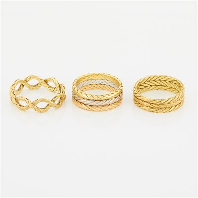 Lot 18 - Buccellati Three Tricolor Gold and Gold Band Rings
