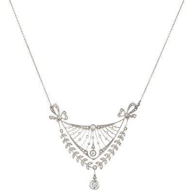 Lot 74 - Belle Époque Platinum, Gold and Diamond Pendant-Necklace