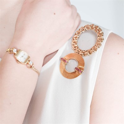 Lot 156 - Tiffany & Co. Gold Circle Brooch and Wristwatch and Gold and Ruby Brooch