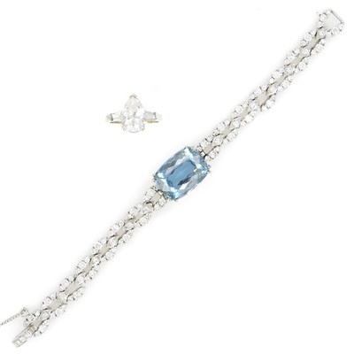 Lot 59 - Platinum, White Gold, Blue Topaz and Diamond Bracelet and White Gold and Cubic Zirconia Ring
