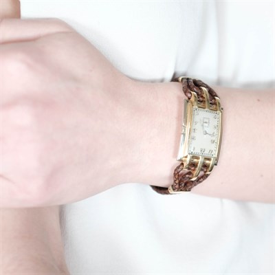 Lot 119 - Two-Color Gold and Leather Wristwatch, France