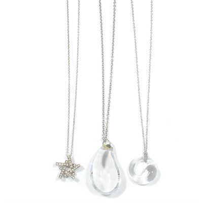 Lot 51 - Tiffany & Co., Frank Gehry, Elsa Peretti Three Platinum, White Gold, Rock Crystal and Diamond Pendant-Necklaces