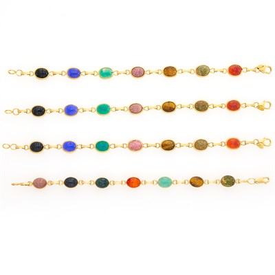 Lot 64 - Four Gold and Hardstone Scarab Bracelets