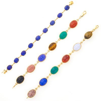 Lot 114 - Three Gold, Lapis and Hardstone Scarab Bracelets