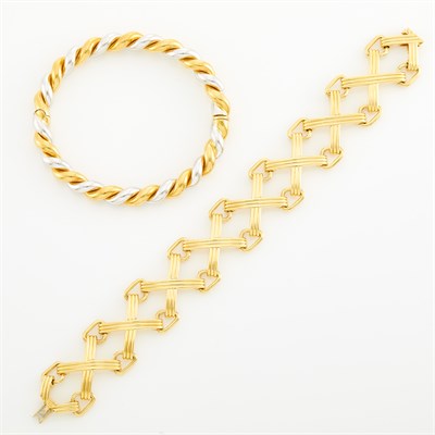 Lot 277 - Two-Color Gold Bangle Bracelet and Tiffany & Co., Schlumberger Gold Link Bracelet