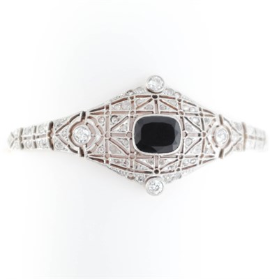 Lot 214 - Platinum, Gold, Black Onyx and Diamond Bracelet