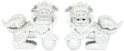 Lot 835 - Pair of Blanc-de-Chine Porcelain Lions 20th...