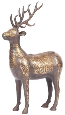 Lot 890 - Qajar Damascened Steel Figure of a Deer...