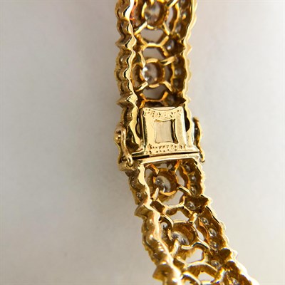 Lot 100 - Federico Buccellati Gold and Diamond Bangle Bracelet