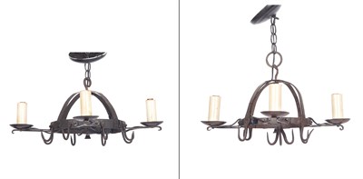 Lot 138 - Two Wrought Iron Four-Light Chandeliers Each...