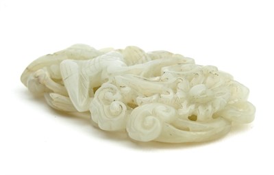 Lot 23 - A Chinese Carved White Jade Plaque