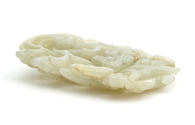 Lot 23 - A Chinese Carved White Jade Plaque