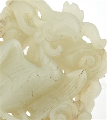 Lot 23 - A Chinese Carved White Jade Plaque