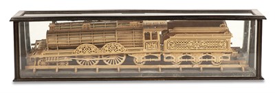 Lot 232 - Carved Wood Model of a Locomotive In a glazed...