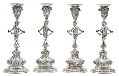 Lot 271 - Set of Four German Silver Figural Candlesticks...