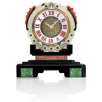 Lot 131 - Cartier Art Deco Gold, Platinum, Black Onyx, Carved Jade and Coral, Cabochon Colored Stone, Diamond and Enamel Desk Clock, France