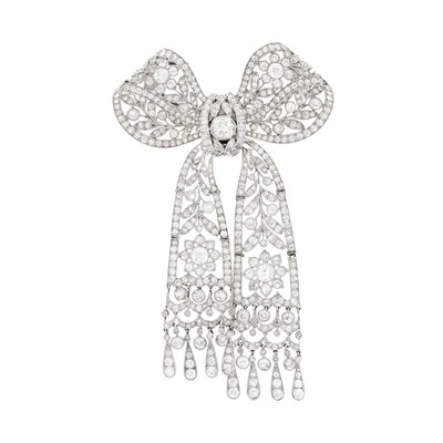 Lot 85 - Belle Époque Platinum and Diamond Bow Brooch