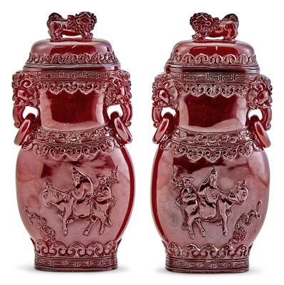 Lot 164 - A Pair of Chinese Faux Amber Vases and Covers
