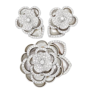 Lot 150 - White Gold, Diamond and Gray Mother-of-Pearl Flower Clip-Brooch and Pair of Earclips