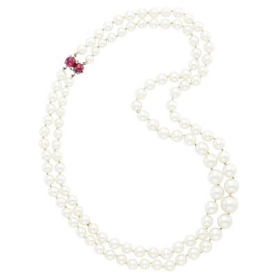 Lot 1108 - Double Strand Cultured Pearl Necklace with Gold and Cabochon Ruby Clasp