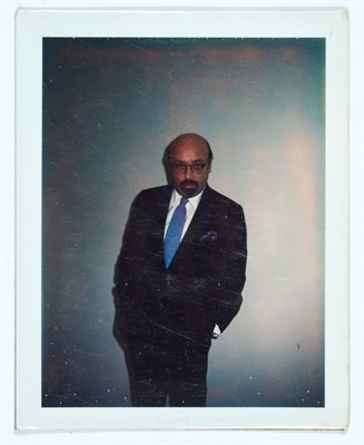 Lot 1143 - BERLIN, BRIGID Polaroid of Ahmet Ertegun at...
