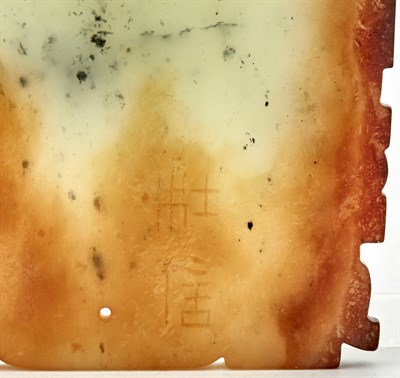 Lot 27 - A Rare Chinese White and Russet Jade Taotie...