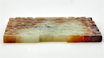 Lot 27 - A Rare Chinese White and Russet Jade Taotie...