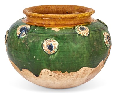 Lot 228 - A Chinese Sancai-Glazed Pottery Jar Molded...