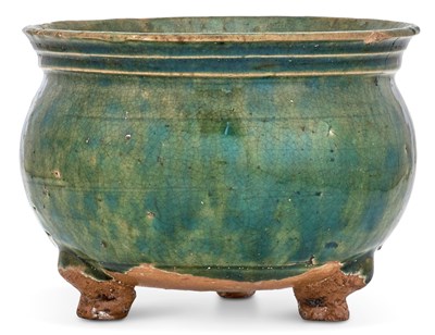 Lot 224 - A Chinese Green and Auburn Glazed Tripod...