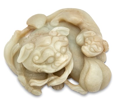 Lot 37 - A Chinese Celadon Jade Fu Lion Grouping Qing...