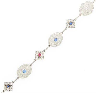 Lot 2088 - Gold, Platinum, Diamond, Ruby and Sapphire Bracelet