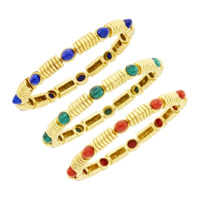 Lot 163 - Three Gold, Lapis, Malachite and Coral Bangle Bracelets