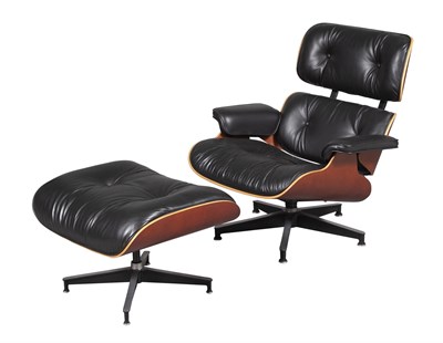 Lot 317 - Charles and Ray Eames for Herman Miller Leather Upholstered Walnut Lounge Model 670 and 671 Armchair and Ottoman