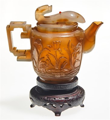 Lot 78 - A Chinese Carved Agate Wine Pot