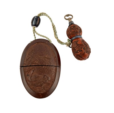 Lot 223 - A Japanese Wood Inro with Carved Bottle Gourd Netsuke