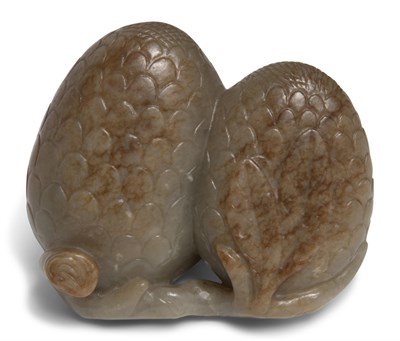 Lot 60 - A Chinese Celadon Jade Carving of Lychee