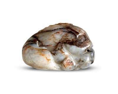 Lot 27 - A Chinese Mottled Jade Carving of a Fish