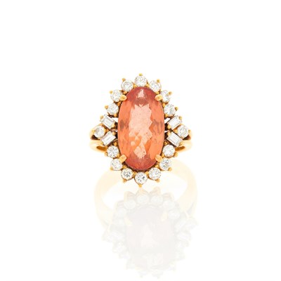 Lot 1119 - Gold, Topaz and Diamond Ring
