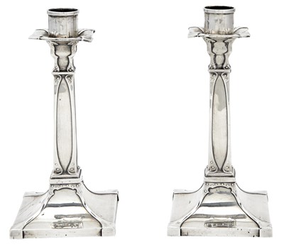Lot 218 - Pair of Edwardian Arts and Crafts Sterling Silver Candlesticks
